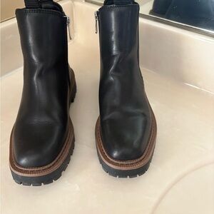 Elegant Black Ankle Boots with Brown Sole